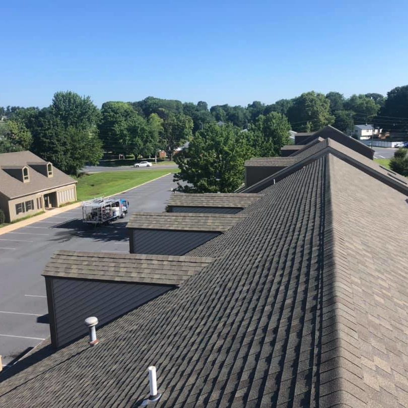 Liberty SoftWash can rid you of your ugly roof problem in Pennsylvania, Maryland and Delaware. The process we use when cleaning all types of roofing materials including asphalt shingles, slate tiles, cedar shake, metal and tile roofs, is called softwashing. The softwash process utilizes a low-pressure cleaning solution application which will remove the black streaks, algae, lichen and moss from your roof.